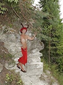 Forest Satyr On The Rock