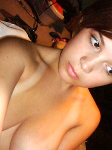 Gorgeous Brunette Teen Shoots Herself Topless
