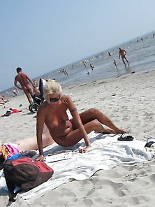 Blond Girl Nude On The Beach