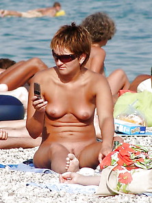 Girl With Well Shaved Pussy On The Fkk Beach