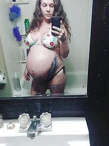 Tattooed Pregnant Woman