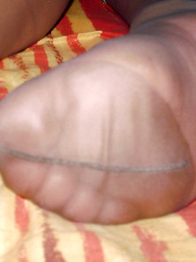 The Smelly Feet Of Madam On The Bed After She Got Banged