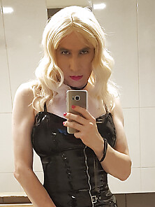 Blonde In Latex Black Dress