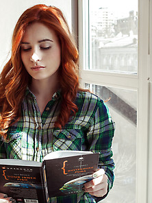 Redhead Reads A Book,  Takes Off Her Plaid Shirt And Grey Lingeri