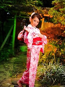 Cute Asian Geisha Teases In Her Bright Pink Kimono