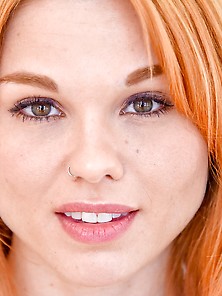 Redheaded Beauty With A Landing Strip Fucks Herself With A Glass