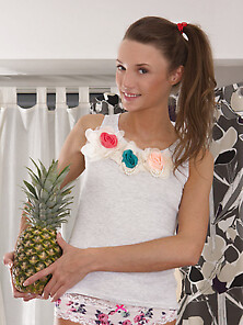 Female Has A Xxx Photo Shoot Poses Naked With A Pineapple In Her