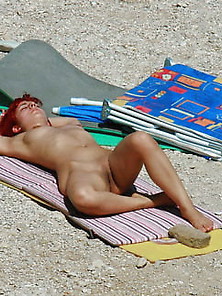 Redhead Girl Nude At The Beach