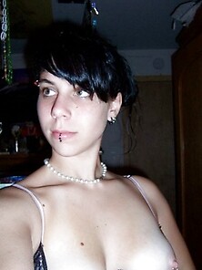 Pierced Goth Chick Shows Breasts And Pussy