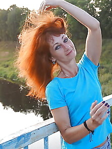Flamehair In Evening On The Bridge