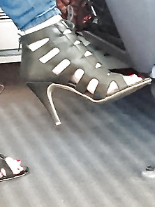 Public Feet Shoes In The Train