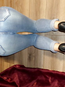 Open Toe Shoes And Worn Jeans
