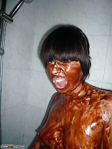 Brunette Takes A Chocolate Bath