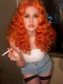 Smoking Redhead Beauty