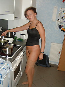 Milf Is Preparing Lunch At Home