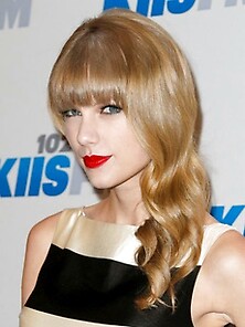 Taylor Swift Looking Leggy At The Jingle Ball