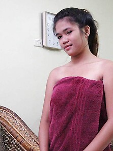 Thai Babe Opens Her Red Towel Flaunting Pubic Topiary And Being