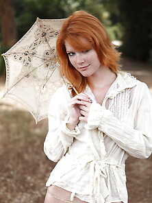 Ginger Babe Thinks Nobody Will See Her Naked Under The Umbrella