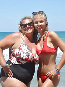 Mom And Daugther On Beach