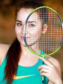 Tennis-Playing Redheaded Cutie Shows Her Toned Body Outdoors Vid