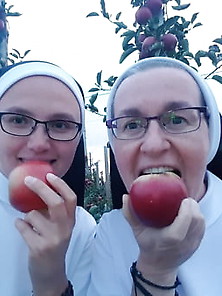 Nuns Eating Apple