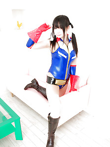 Asian Cosplay Girl In Pvc One Piece Suit