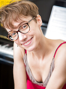 Ugly Short-Haired Musician With Glasses Teases Herself While Pla