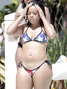 Angela Simmons Flaunts Curves In Swimsuits