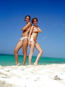 Girlfriends Enjoy Vacation On The Beach