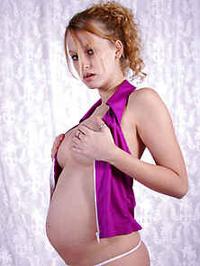 Pregnant Teen Busting Out Of Her Purple Suit