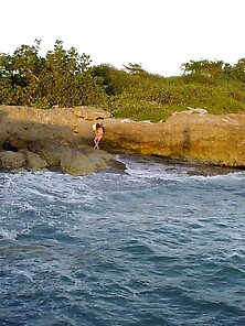 Posing Nude By The Ocean